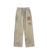 SSSAINT LOUIS Paint‑Splatter Sweat Pants