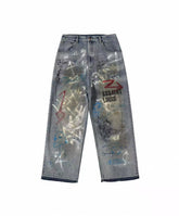 SSSAINT LOUIS Graffiti Paint‑Splatter Baggy Jeans
